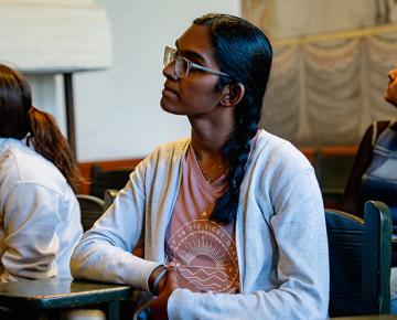 Student sitting at a desk.