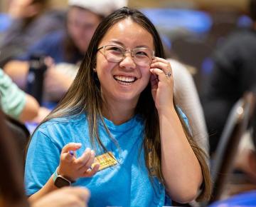 Student smiling wearing a blue shirt