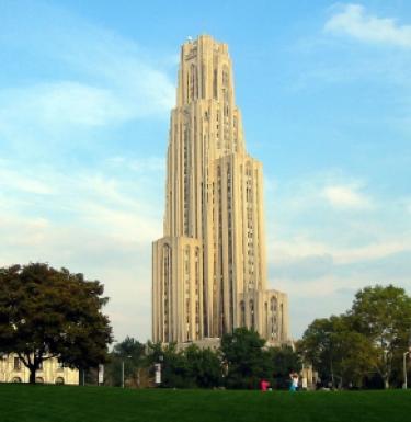 Photo of the Cathedral of Learning on a slightly cloudy day.